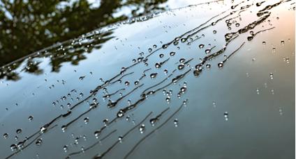 zoom on a car windscreen showing hydrophobic properties